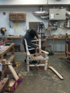 David Koen works on the final fit before he glues his alder chair.